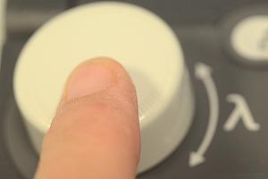 push down and turn for fine