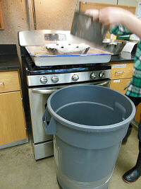 Dipping Sap out of Garbage Can